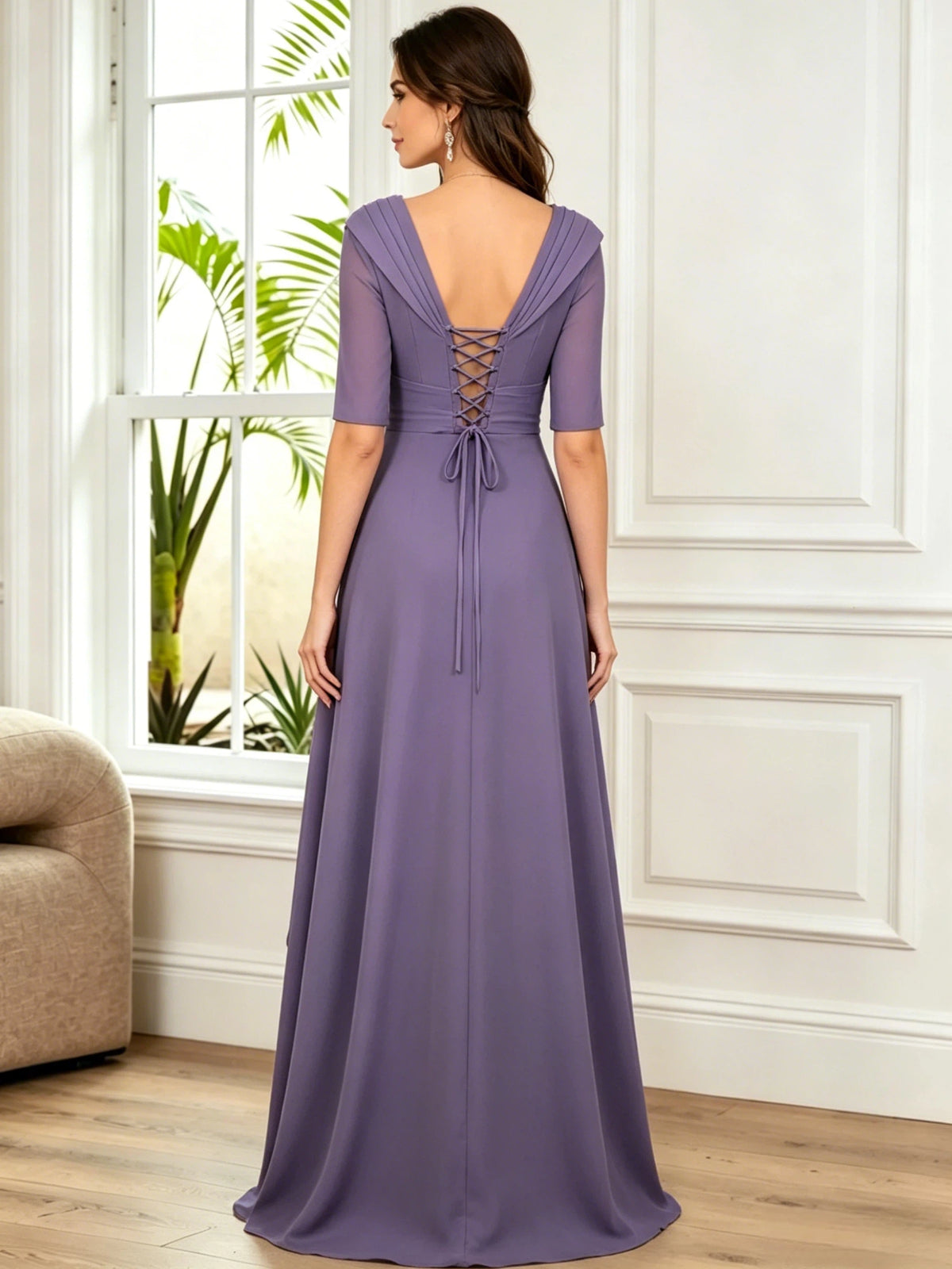 long V-neck chiffon mother of the bride dress with half sleeves, pleated bodice, and side ruffle back or side view of the bridal party dress silhouette