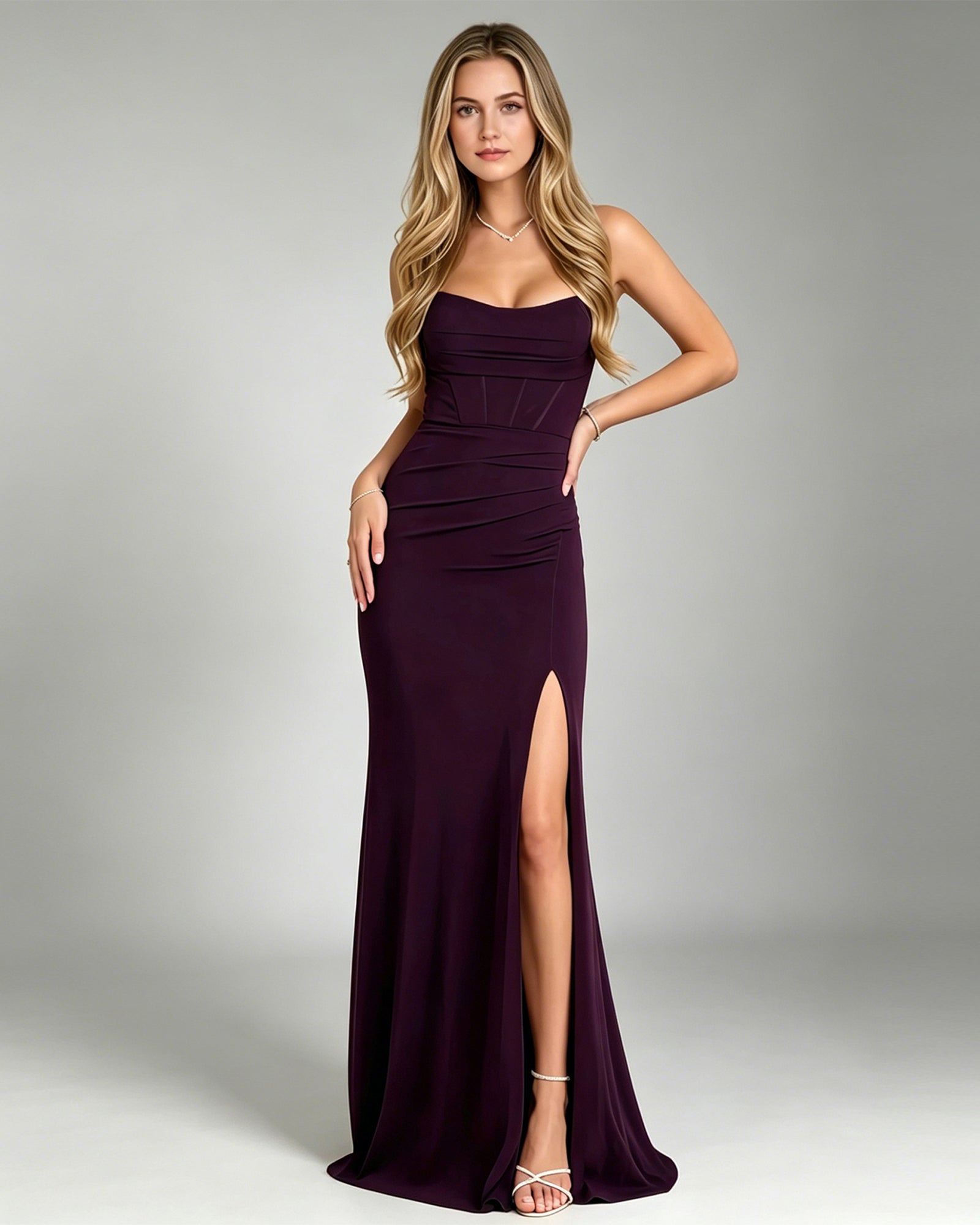 strapless sweetheart bridesmaid dress with corset bodice, ruched waist, and front slit