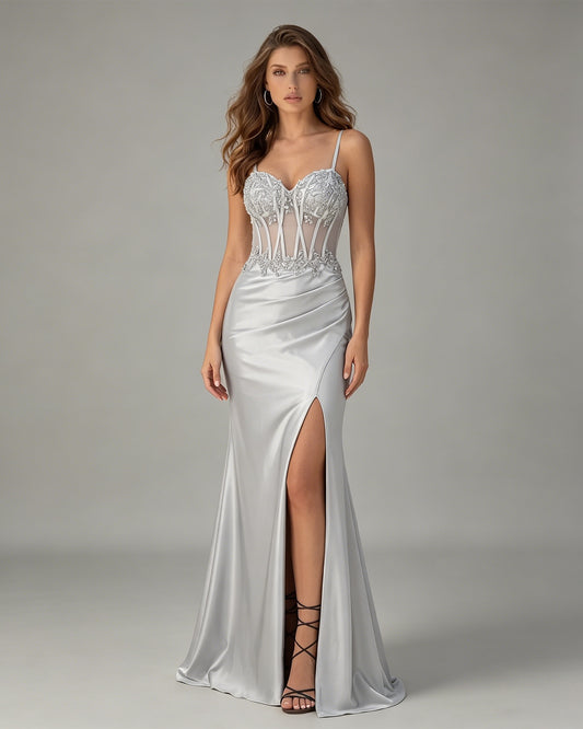spaghetti strap beaded corset satin prom dress with high slit shown on model.