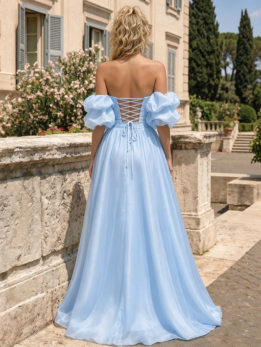 front view of spaghetti strap beaded corset satin prom dress with high slit for prom and evening events.